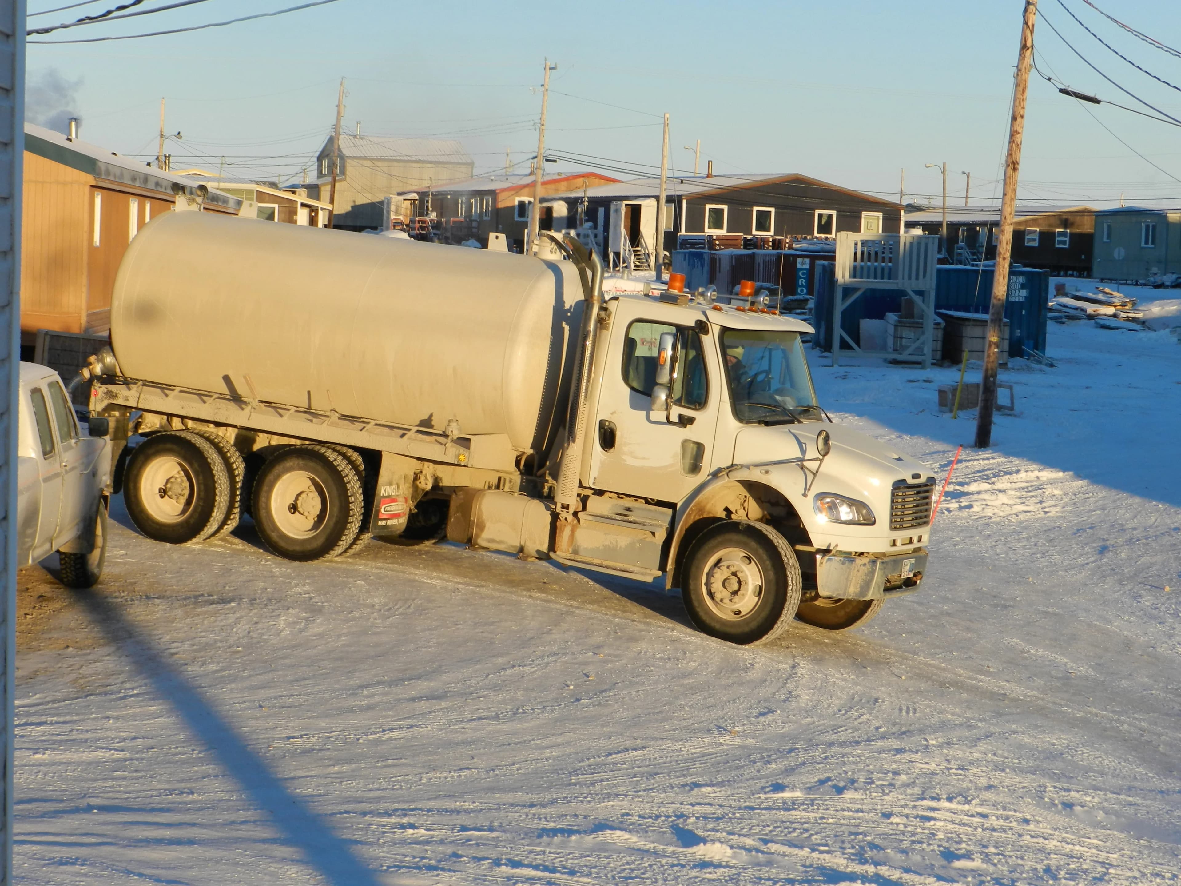 Vacuum truck at a pumping station visit